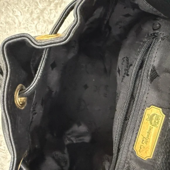 MCM Black Leather Backpack with Gold Accents - Picture 13 of 15